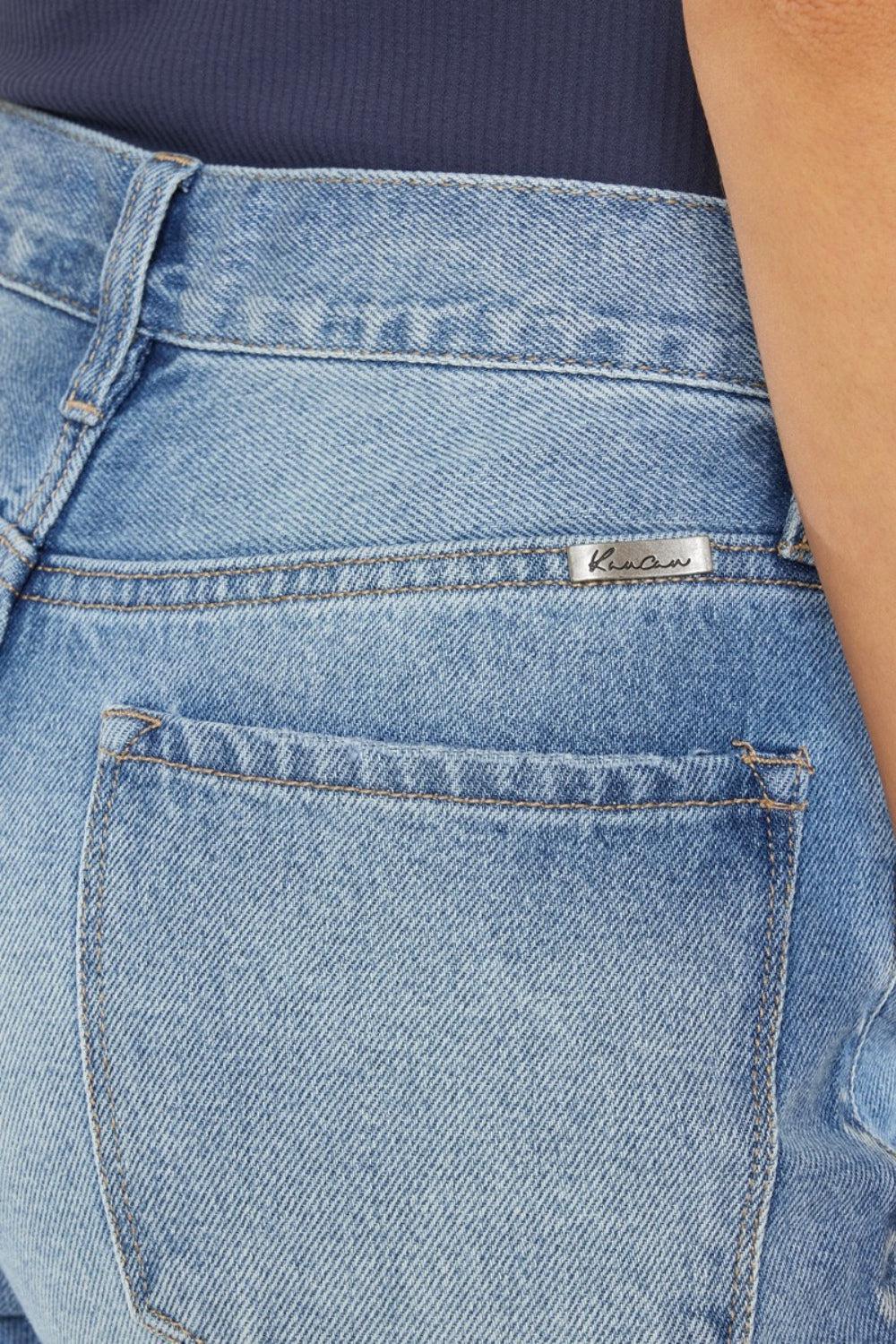 a close up of a woman's butt showing the back of her jeans
