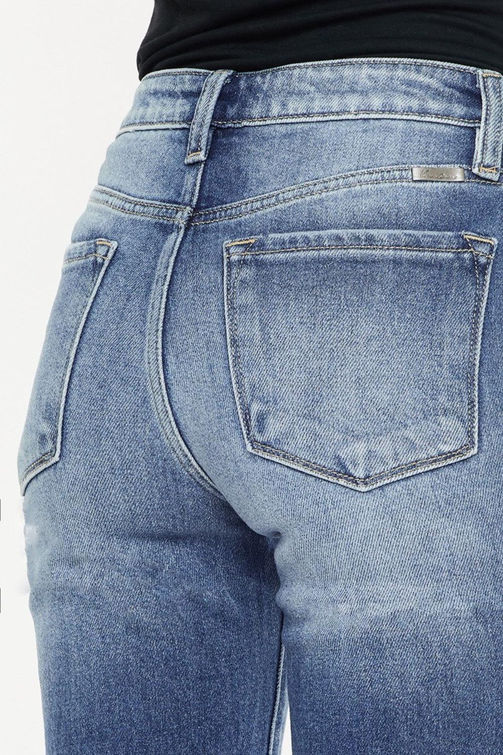 the back of a woman's jeans pants