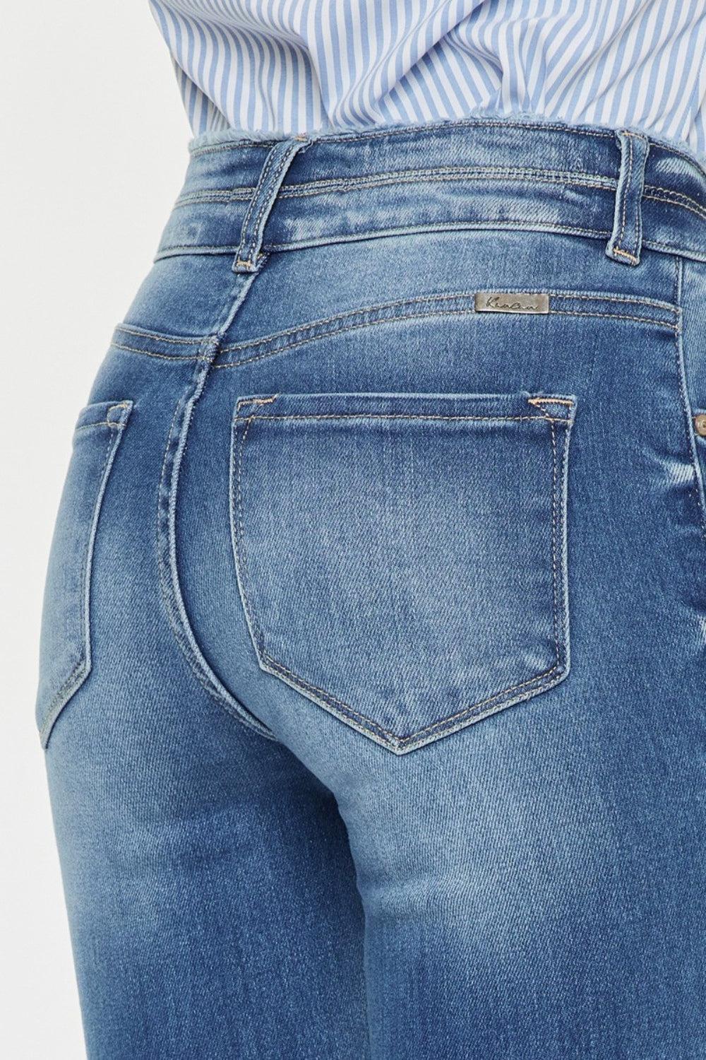 the back of a woman's jeans pants