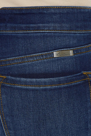a close up of a person wearing a pair of jeans