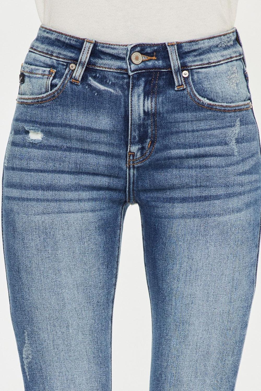 a pair of jeans with holes on the side
