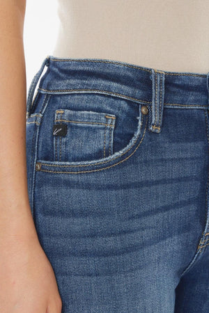 a close up of a person wearing jeans