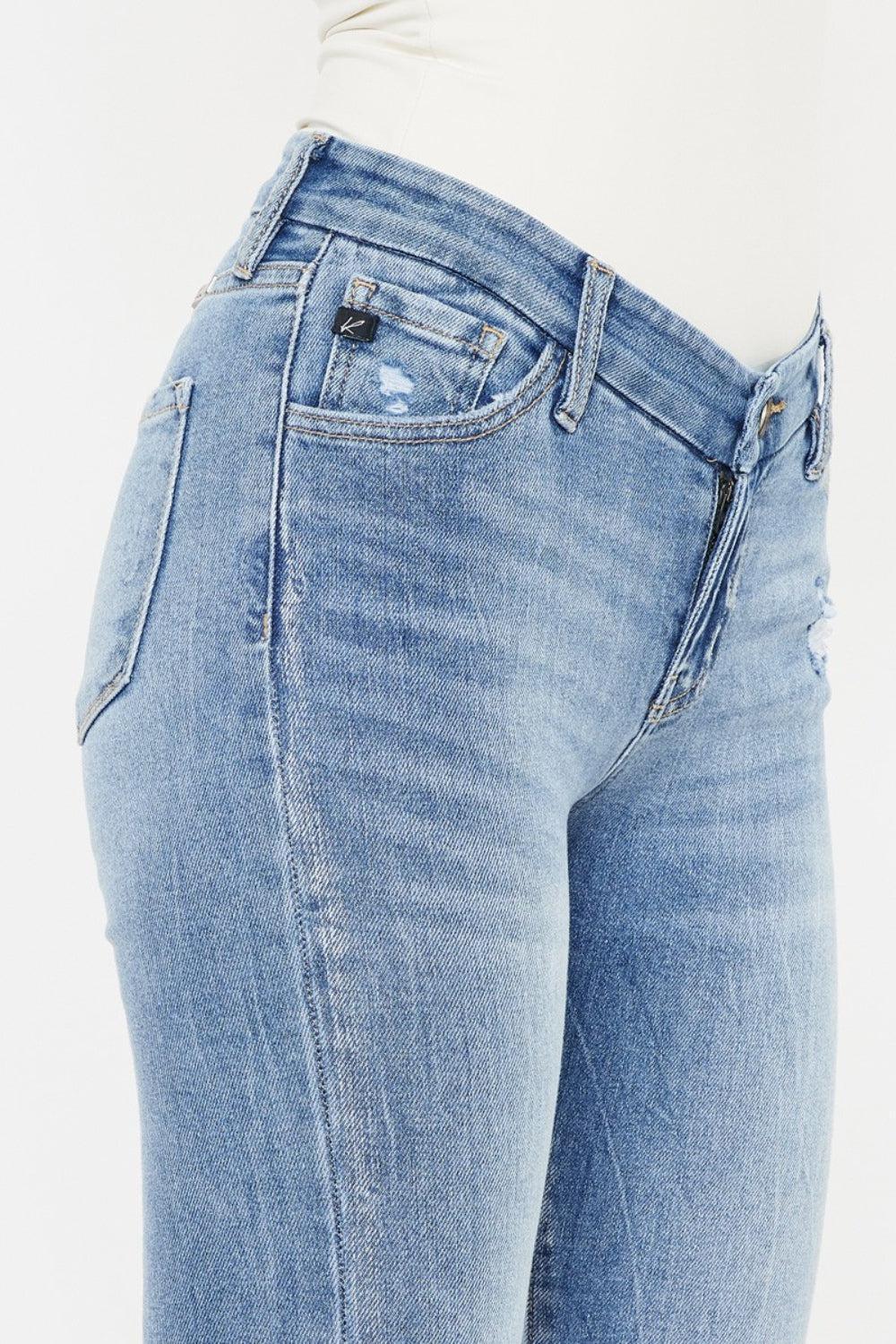 a woman's butt showing the back of her jeans