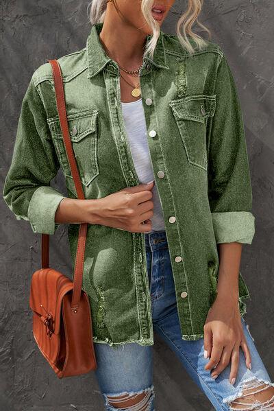 a woman wearing a green jean jacket and ripped jeans