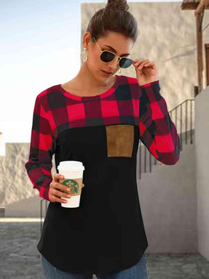 a woman holding a cup of coffee and wearing sunglasses