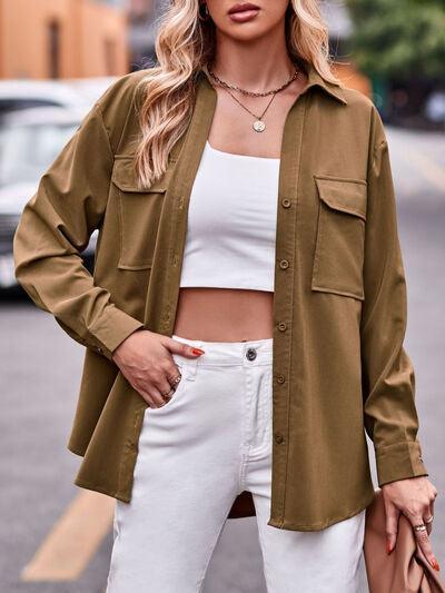 a woman wearing a tan jacket and white pants