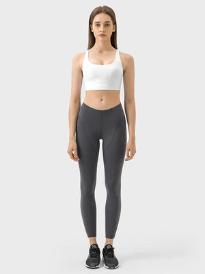 a woman in a sports bra top and leggings