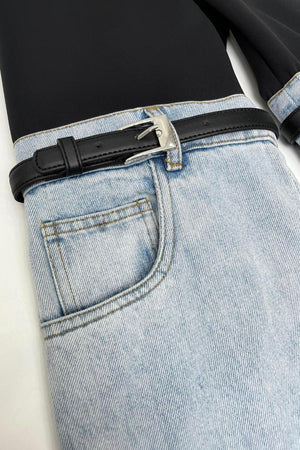 a pair of jeans with a black belt
