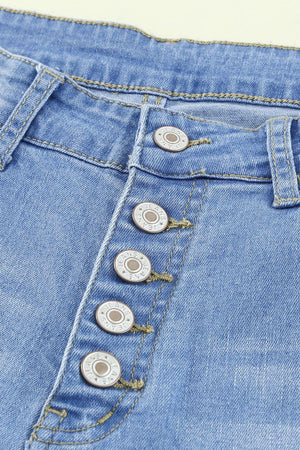 a pair of jeans with buttons on them