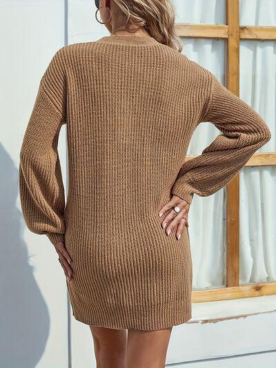 a woman wearing a brown sweater dress