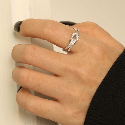 a woman's hand with a ring on it