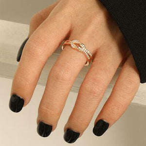 a woman's hand with a ring on it