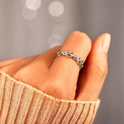 a woman's hand with a ring on it