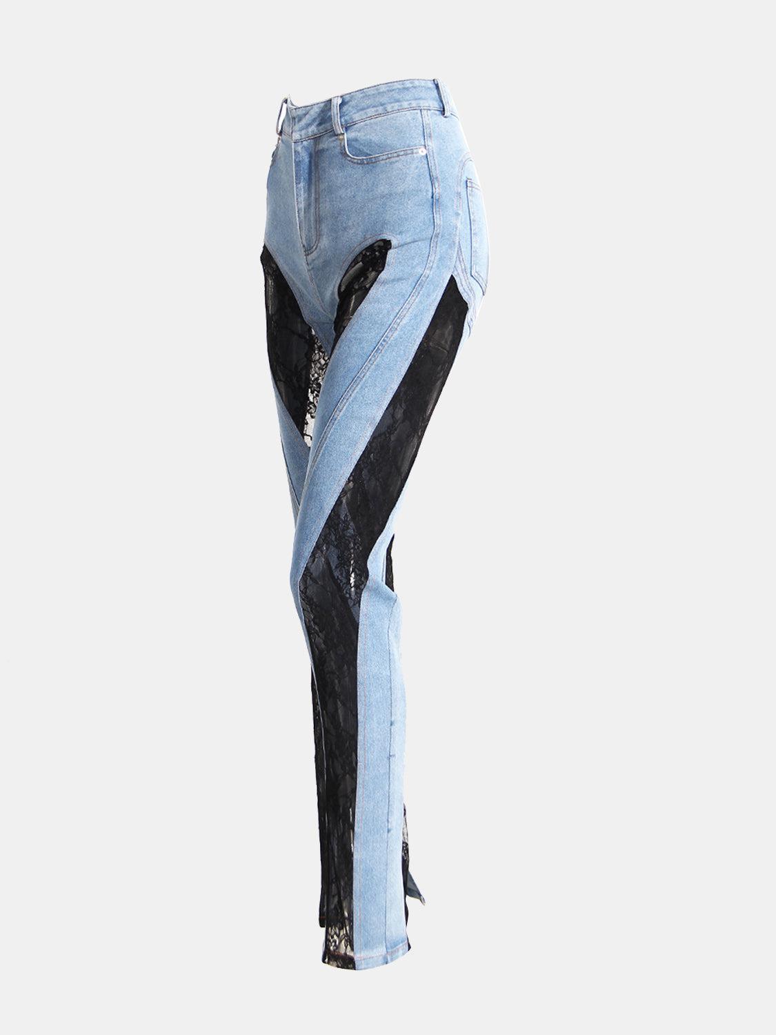 a pair of blue jeans with black patches