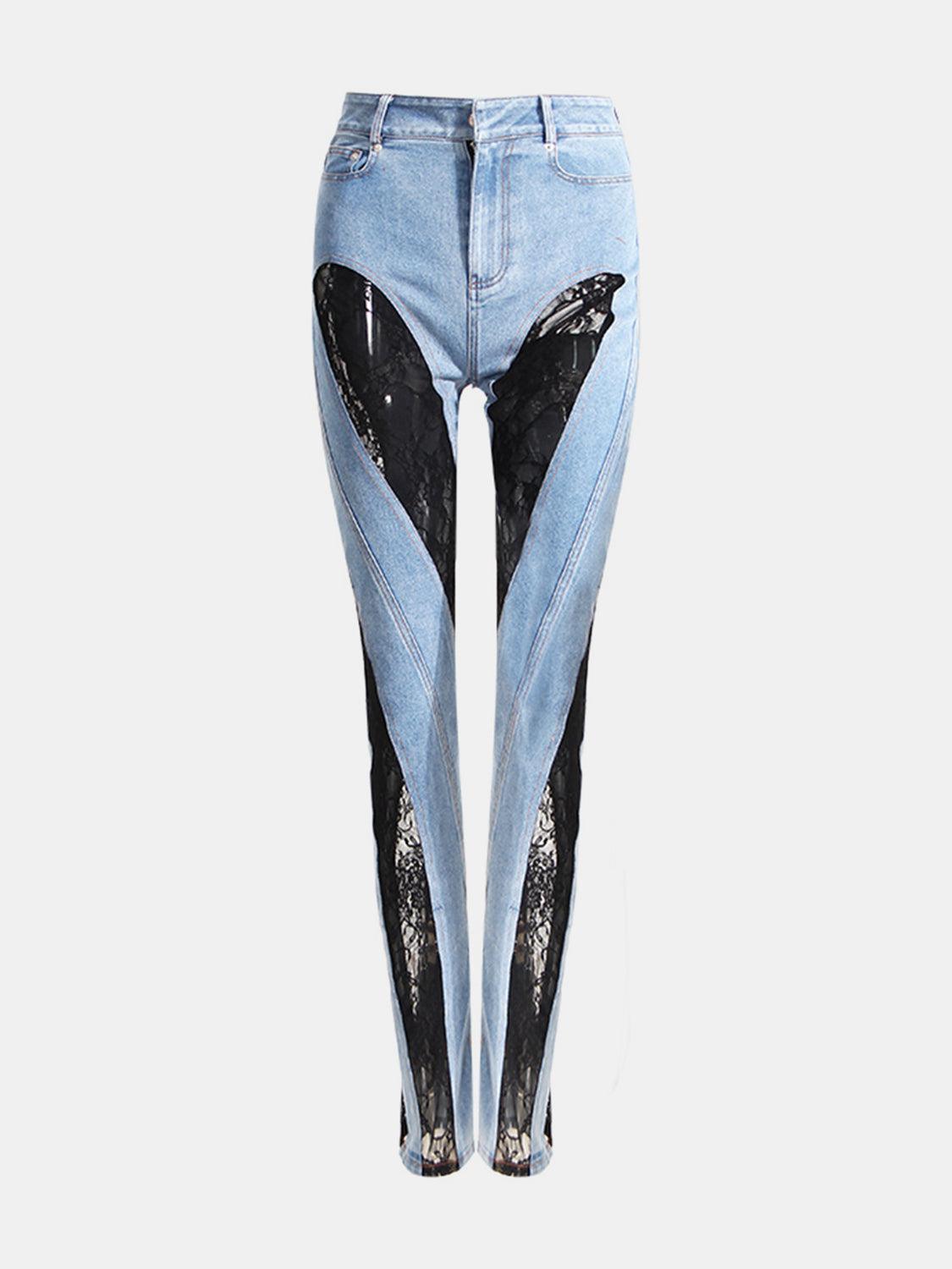a pair of jeans with a black bird on them