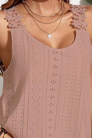 a close up of a woman wearing a tank top