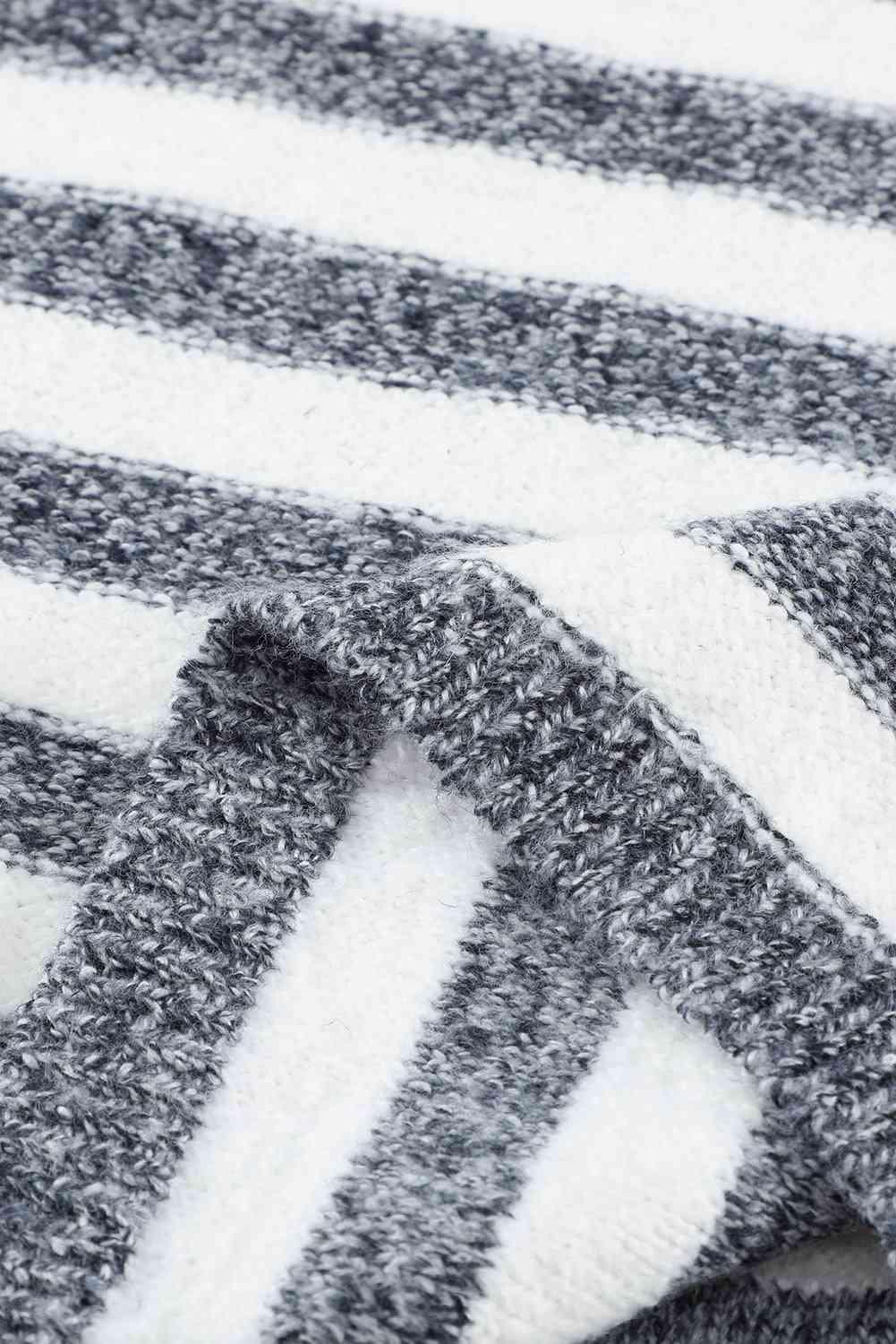 a close up of a black and white blanket