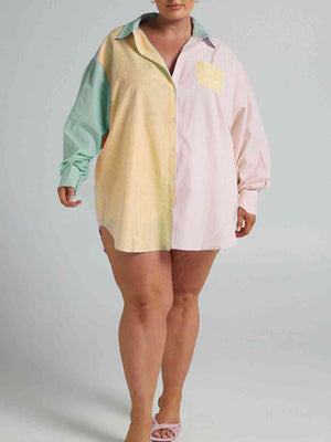 a woman in a colorful shirt and shorts