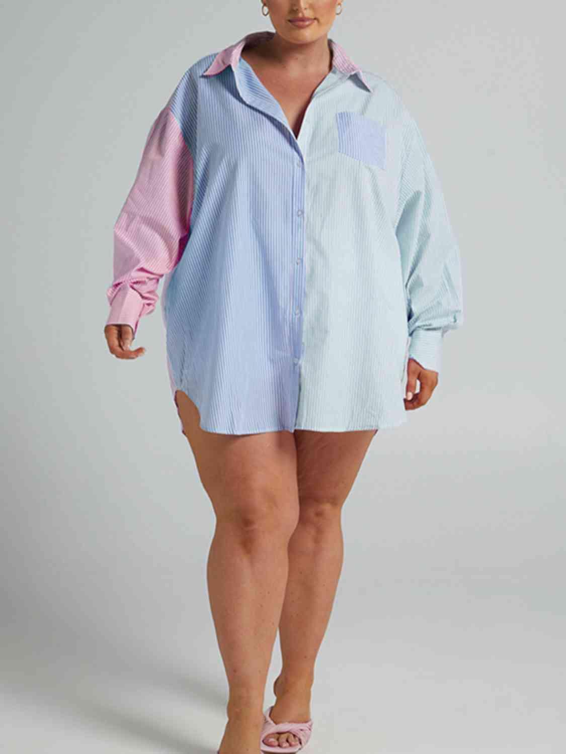 a woman in a blue and pink shirt dress