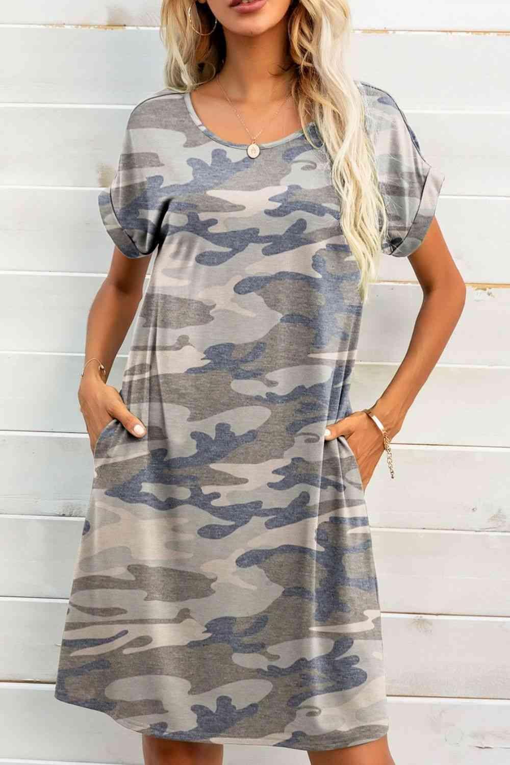 a woman wearing a camo print dress