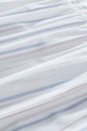a close up of a white shirt with blue and red stripes