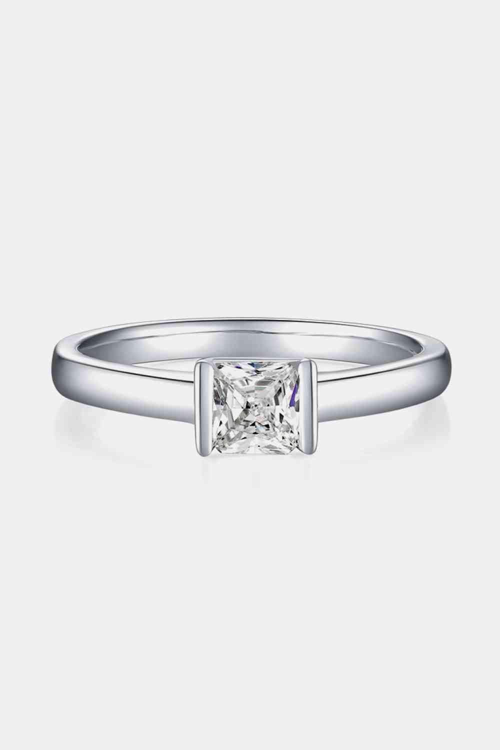 a princess cut diamond engagement ring with a princess cut diamond in the center