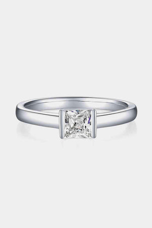 a princess cut diamond engagement ring with a princess cut diamond in the center