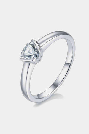 a heart shaped diamond ring on a white background