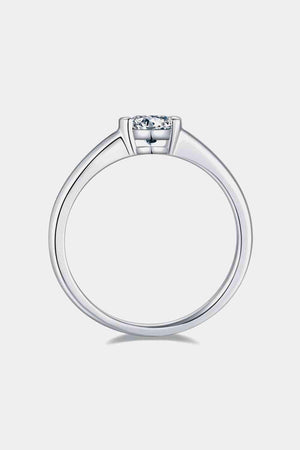 a white gold engagement ring with a princess cut diamond