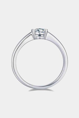 a white gold ring with a square cut diamond