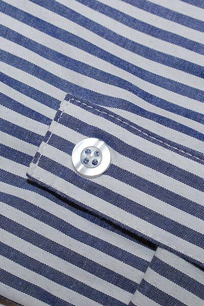 a close up of a blue and white striped shirt