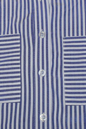 a close up of a blue and white striped shirt