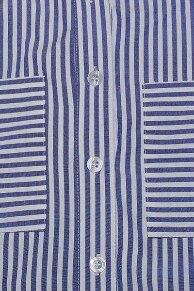 a close up of a blue and white striped shirt