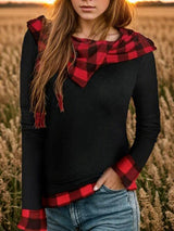 a woman standing in a field of tall grass