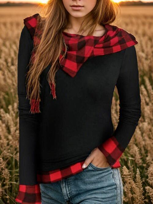 a woman standing in a field of tall grass