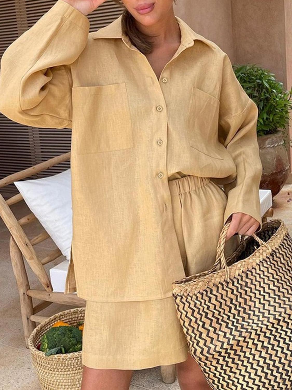 a woman wearing a tan shirt dress and hat