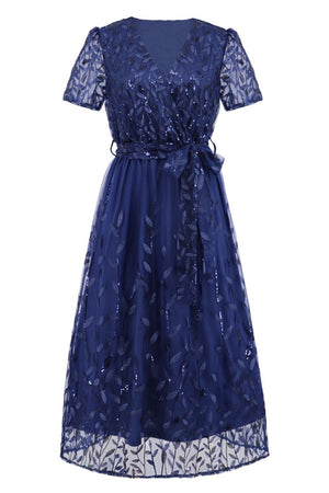 a women's blue dress with a floral pattern