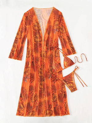 a women's orange dress with matching accessories