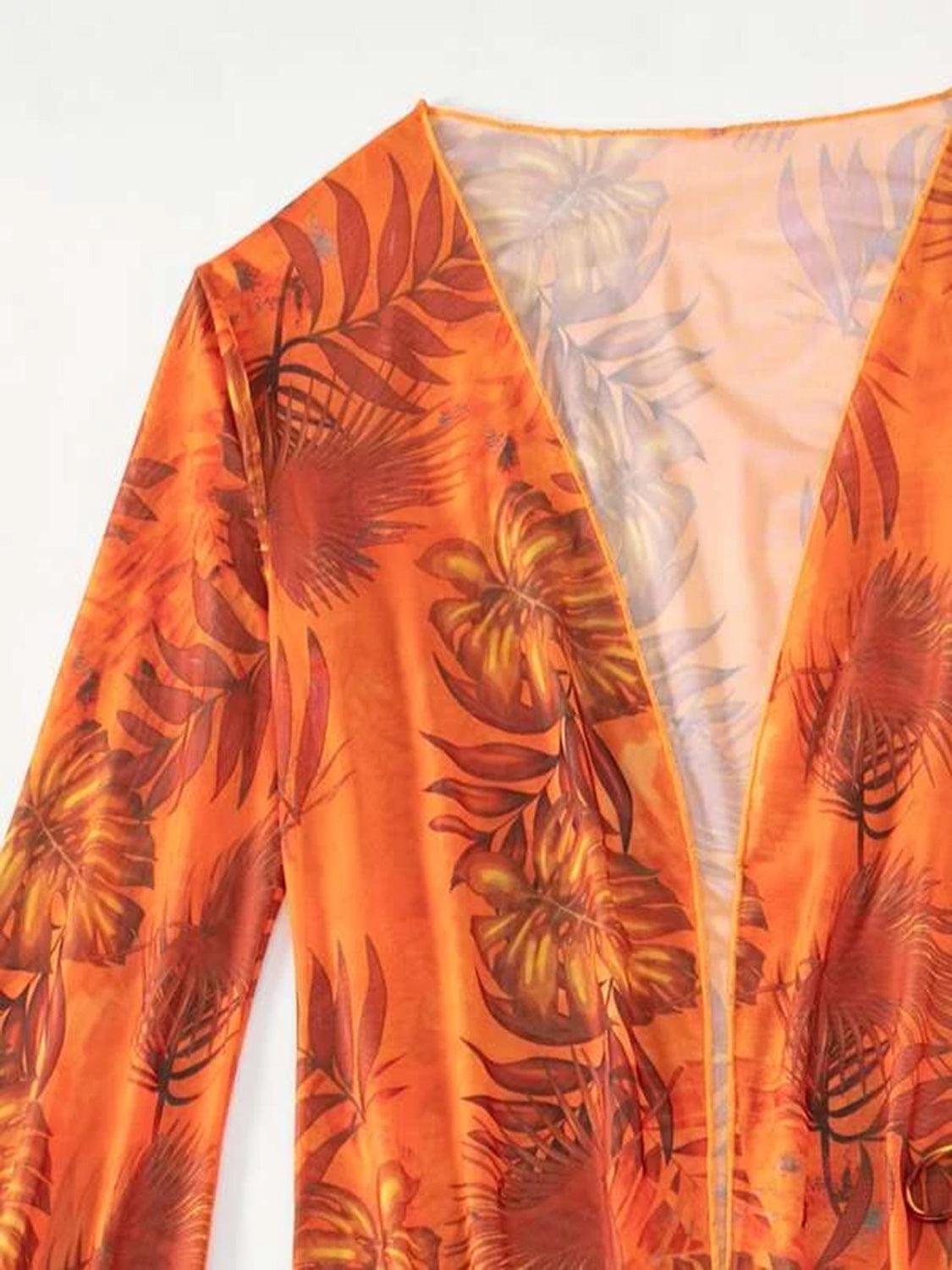 an orange jacket with a floral pattern on it