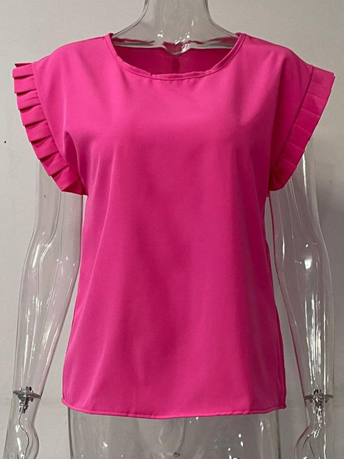 a mannequin wearing a pink top with ruffles