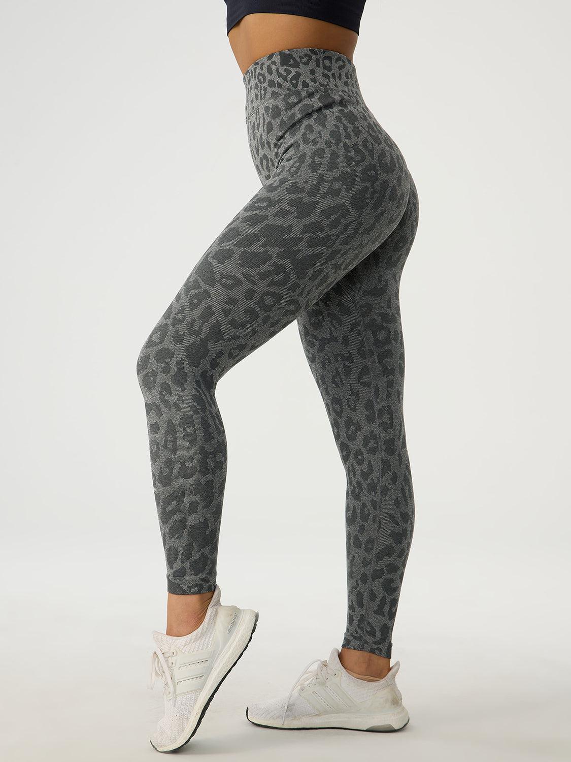 a woman in grey leopard print leggings