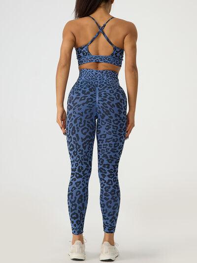 a woman in blue leopard print sports bra top and leggings