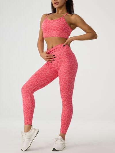 a woman in a pink sports bra top and patterned leggings