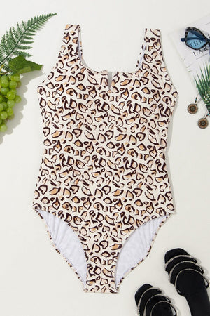 a bathing suit with a leopard print on it