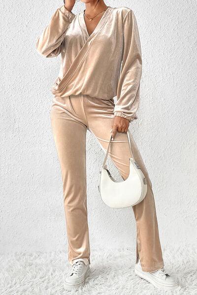 a woman in a gold outfit holding a white purse