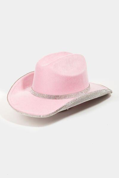 a pink cowboy hat on a white background