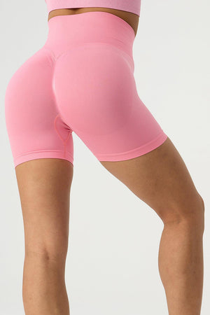 a close up of a woman's butt in a pink shorts