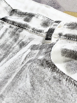 a close up of a white and black shirt