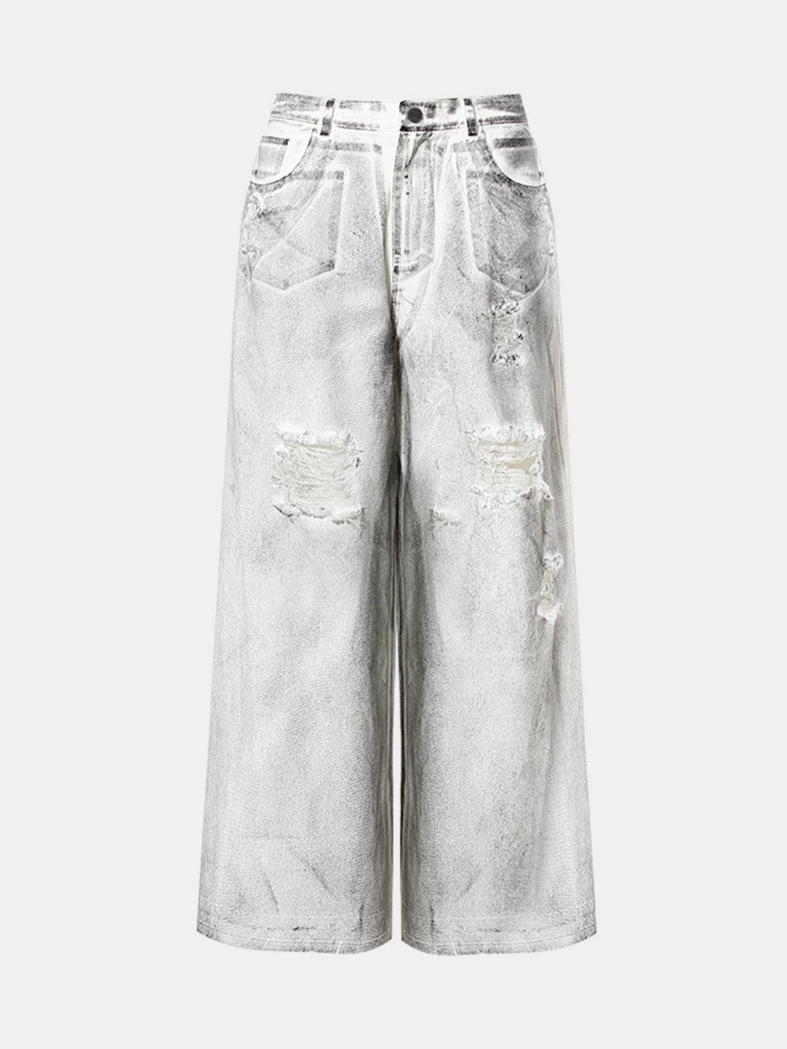 a pair of white jeans with holes on them