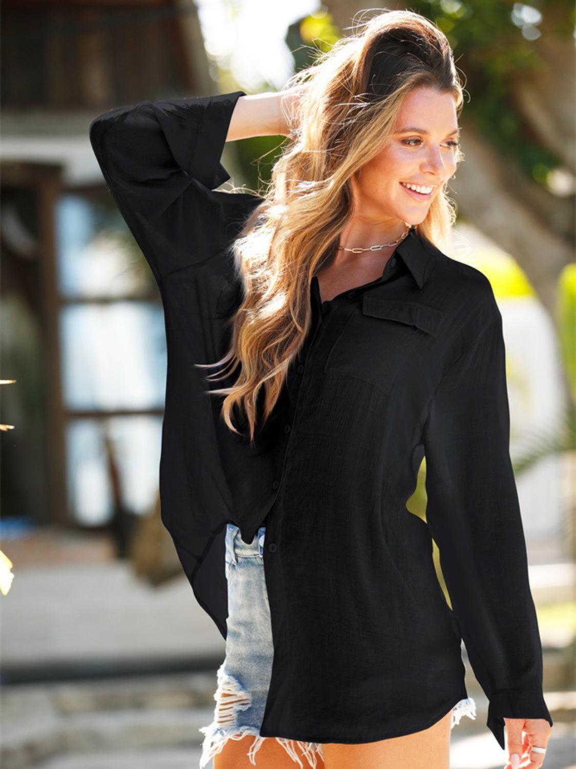 a woman in a black shirt and orange shorts